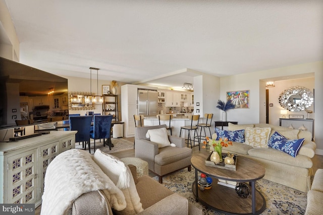 309 Yoakum Pkwy Unit 1608, Alexandria, VA 22304 - living area featuring a chandelier