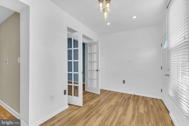 945 Randolph St NW Unit A, Washington, DC 20011 - empty room featuring french doors, light wood-type flooring, baseboards, and recessed lighting