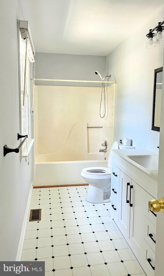 bathroom featuring shower / bath combination, visible vents, vanity, tile patterned floors, and toilet
