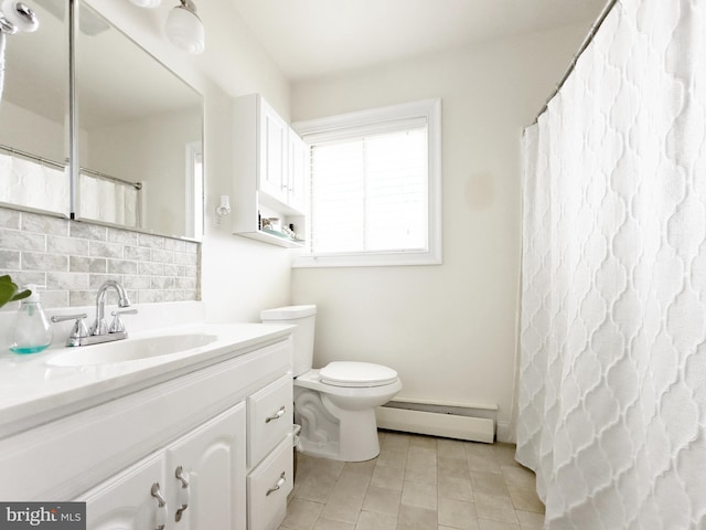 1306 Bayshore Ave, Brigantine, NJ 08203 - bathroom featuring vanity, toilet, tile patterned floors, a baseboard heating unit, and backsplash
