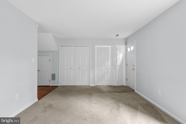 2204 Commissary Cir, Odenton, MD 21113 - unfurnished bedroom featuring carpet flooring, two closets, and baseboards