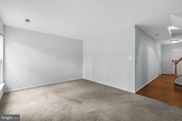 2204 Commissary Cir, Odenton, MD 21113 - carpeted spare room featuring baseboards and stairway