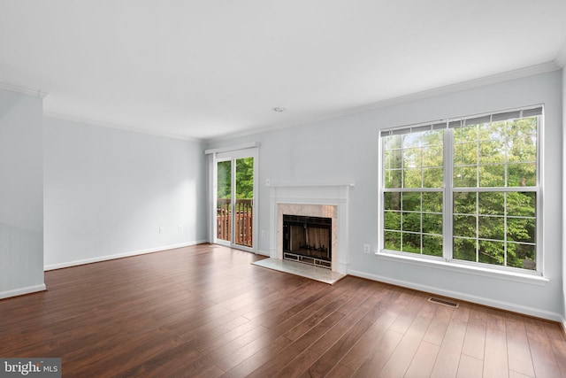 2204 Commissary Cir, Odenton, MD 21113 - unfurnished living room with ornamental molding, healthy amount of natural light, baseboards, and a high end fireplace