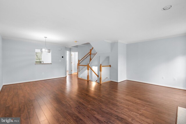 2204 Commissary Cir, Odenton, MD 21113 - unfurnished living room featuring hardwood / wood-style floors, baseboards, and ornamental molding