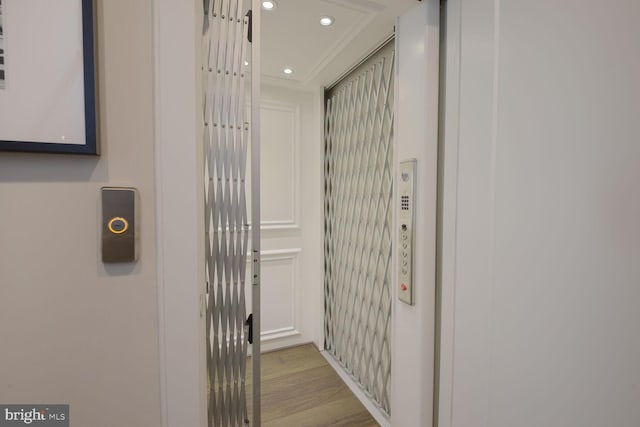 1516 16th Ct N, Arlington, VA 22209 - hall with elevator, recessed lighting, and light wood-style flooring