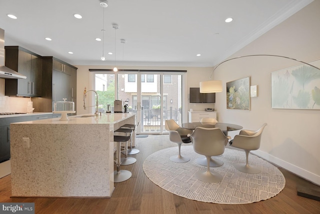 1516 16th Ct N, Arlington, VA 22209 - dining space featuring ornamental molding, recessed lighting, wood finished floors, and baseboards