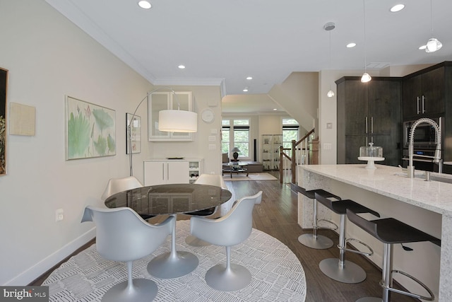 1516 16th Ct N, Arlington, VA 22209 - dining space featuring stairs, dark wood-type flooring, baseboards, recessed lighting, and ornamental molding