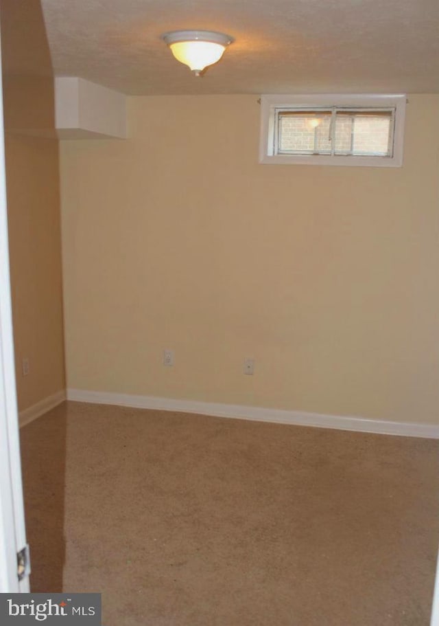 128 Fox Dr, Winchester, VA 22601 - below grade area featuring carpet floors and baseboards
