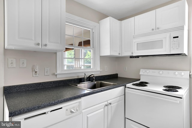 128 Fox Dr, Winchester, VA 22601 - kitchen featuring white appliances, a sink, white cabinets, and dark countertops