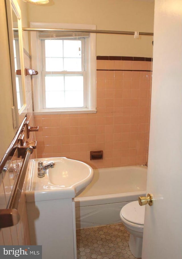 128 Fox Dr, Winchester, VA 22601 - full bath featuring toilet, tile patterned floors, vanity, and shower / washtub combination