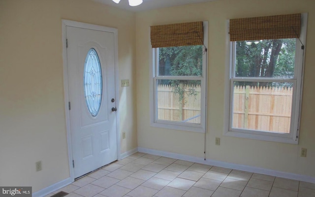 128 Fox Dr, Winchester, VA 22601 - entryway with baseboards and light tile patterned floors