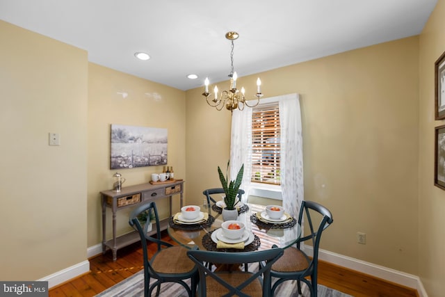 513 Princess Anne St, Fredericksburg, VA 22401 - dining space featuring an inviting chandelier, baseboards, and wood finished floors