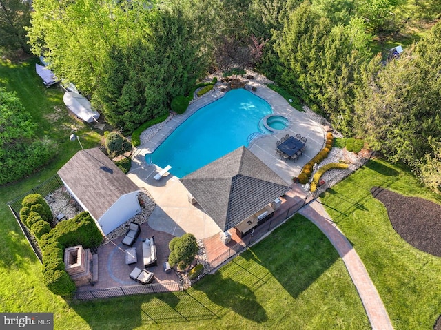 view of subject property with a pool area