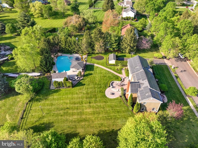 view of property location with a pool