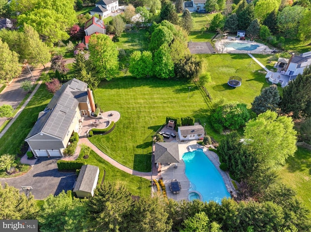 view of property location featuring a pool area