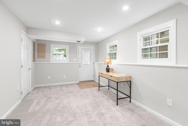 foyer entrance with carpet flooring, recessed lighting, and baseboards