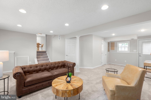living room with recessed lighting, light carpet, and stairway
