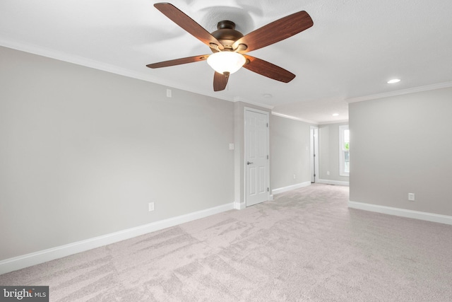 empty room with baseboards, ornamental molding, a ceiling fan, and recessed lighting