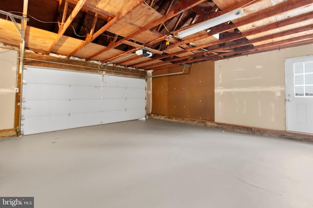 garage featuring a garage door opener