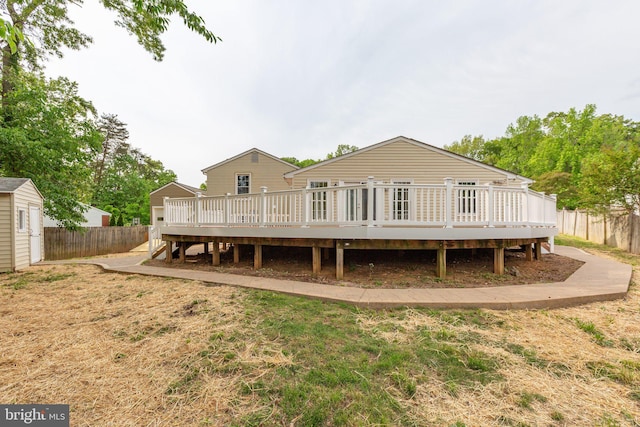 9 Fairfield Ct, Stafford, VA 22554 - back of property featuring a yard, a deck, and fence