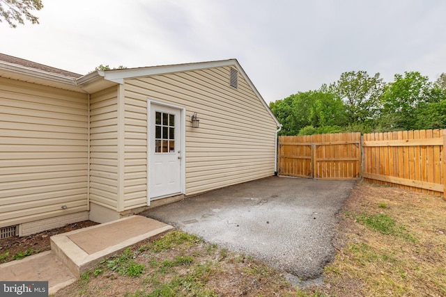 property entrance featuring fence