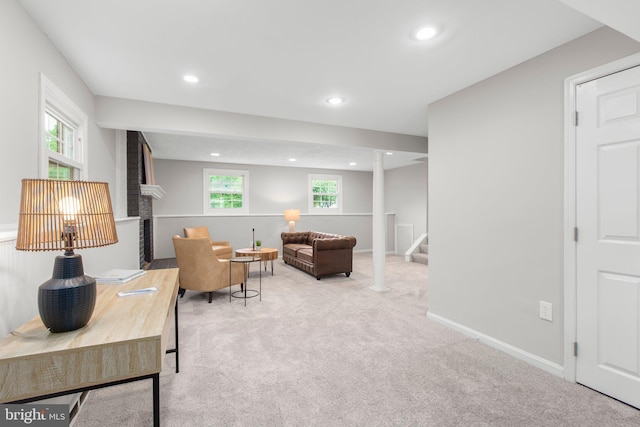 living room with recessed lighting, light carpet, and stairs