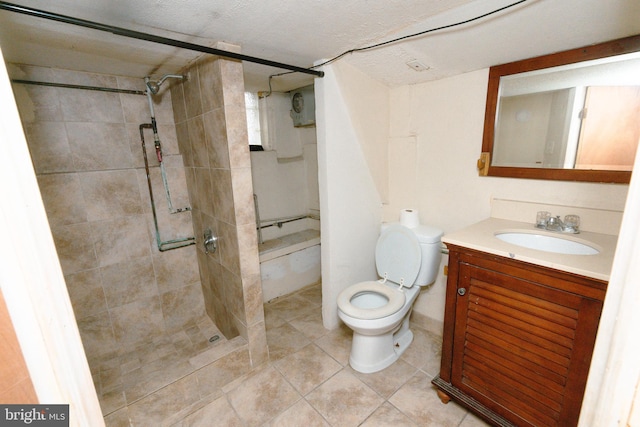 full bath featuring toilet, tile patterned flooring, a stall shower, and vanity