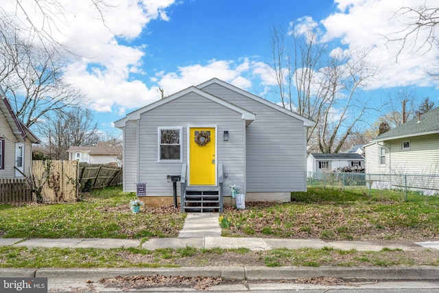 view of front of property with fence and entry steps