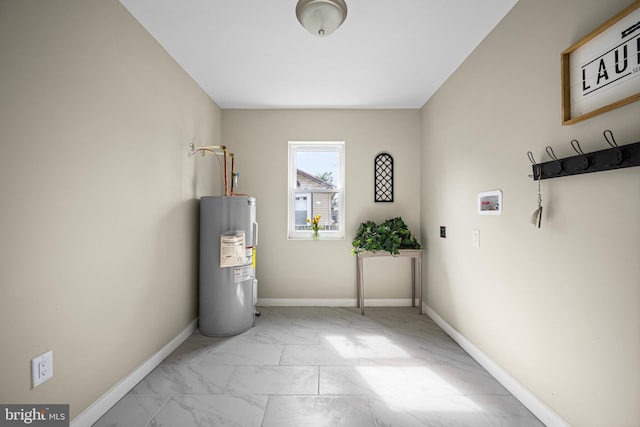 utility room featuring water heater
