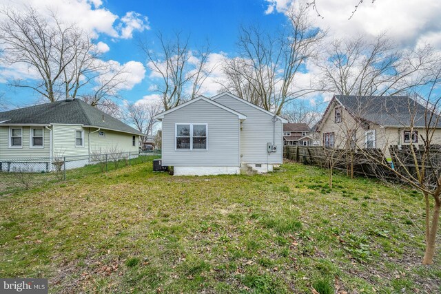290 Garfield St, Carneys Point, NJ 08069 - rear view of house featuring a lawn and a fenced backyard