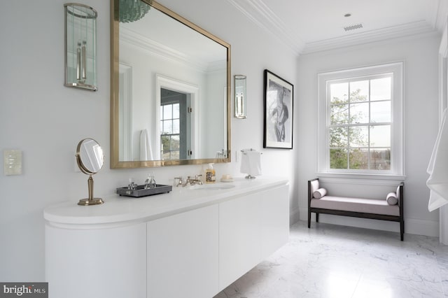 bathroom featuring baseboards, plenty of natural light, ornamental molding, and marble finish floor