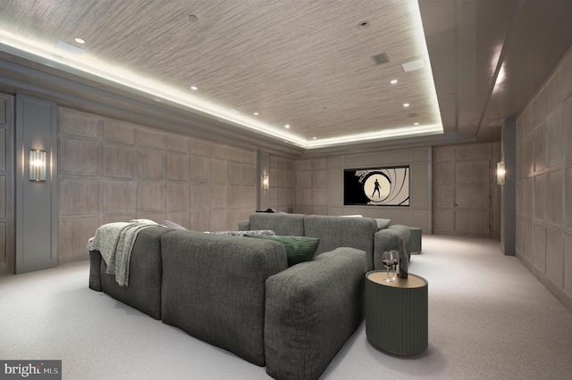 cinema with recessed lighting, light carpet, and a decorative wall