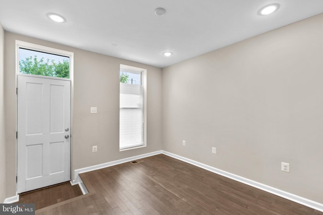 1414 N Bethel St, Baltimore, MD 21213 - foyer featuring baseboards, dark wood-type flooring, and recessed lighting