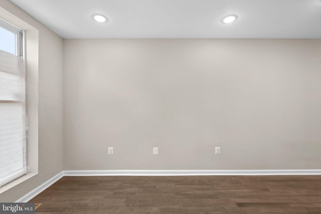 1414 N Bethel St, Baltimore, MD 21213 - unfurnished room with wood finished floors, baseboards, and recessed lighting