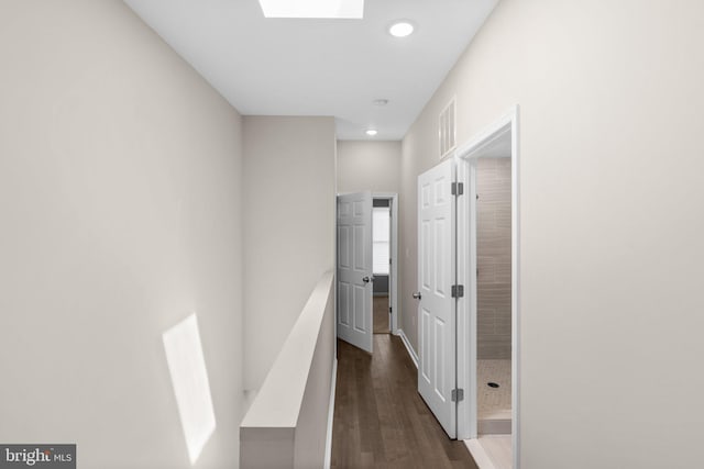 1414 N Bethel St, Baltimore, MD 21213 - corridor featuring dark wood-style flooring, a skylight, and recessed lighting