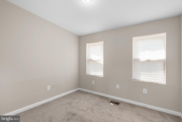 1414 N Bethel St, Baltimore, MD 21213 - carpeted empty room featuring baseboards