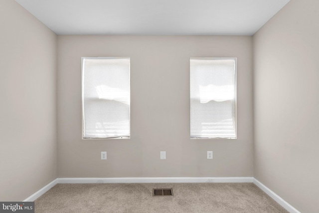 1414 N Bethel St, Baltimore, MD 21213 - empty room with carpet flooring and baseboards