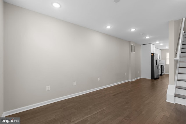 1414 N Bethel St, Baltimore, MD 21213 - unfurnished living room featuring stairway, dark wood finished floors, recessed lighting, and baseboards