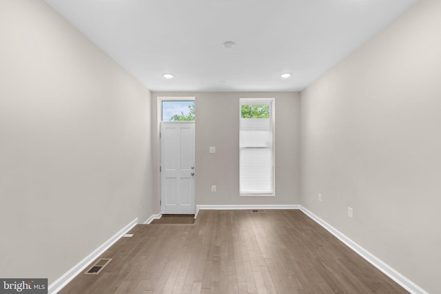 1414 N Bethel St, Baltimore, MD 21213 - foyer with dark wood finished floors, baseboards, and recessed lighting
