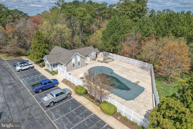 bird's eye view featuring a forest view