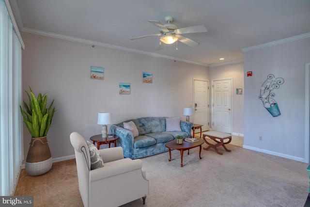 living room featuring crown molding, a ceiling fan, carpet, and baseboards