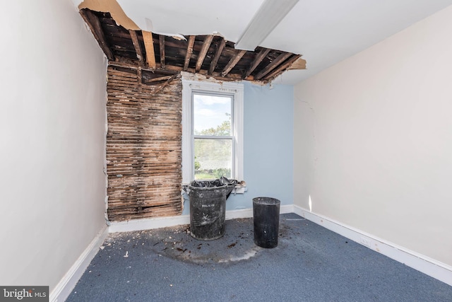 interior space featuring baseboards