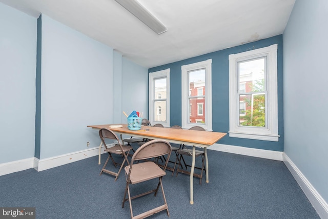 office with carpet floors and baseboards
