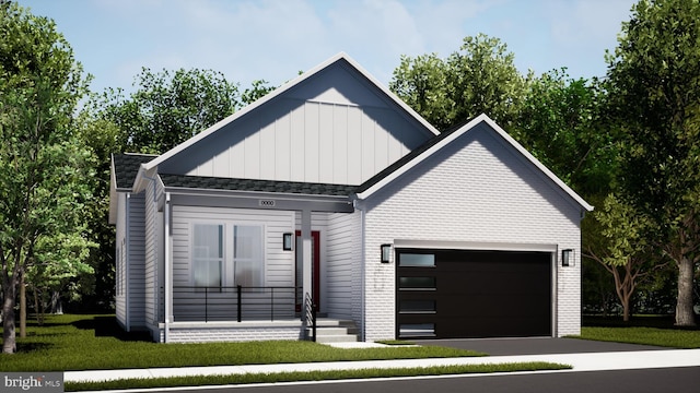 modern farmhouse featuring brick siding, aphalt driveway, roof with shingles, and a garage