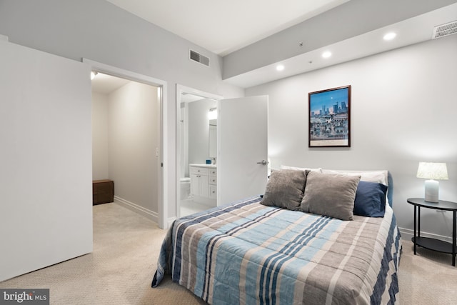 bedroom with recessed lighting, light colored carpet, and visible vents