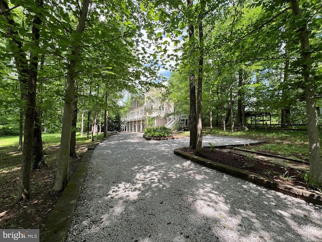 8122 Stacey Rd, Alexandria, VA 22308 - view of community featuring stairway and aphalt driveway