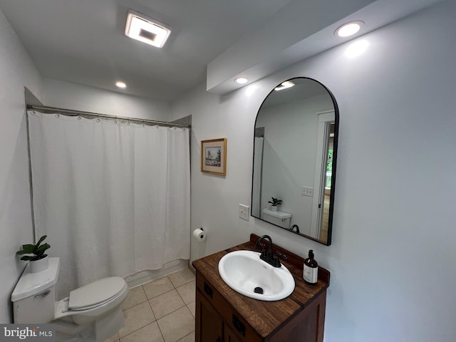 8122 Stacey Rd, Alexandria, VA 22308 - bathroom featuring toilet, shower / tub combo, tile patterned flooring, vanity, and recessed lighting