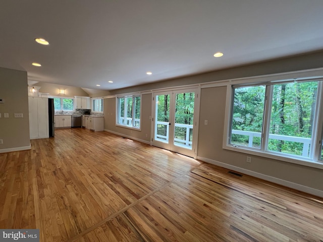 8122 Stacey Rd, Alexandria, VA 22308 - unfurnished living room with baseboards, light wood-style flooring, and recessed lighting