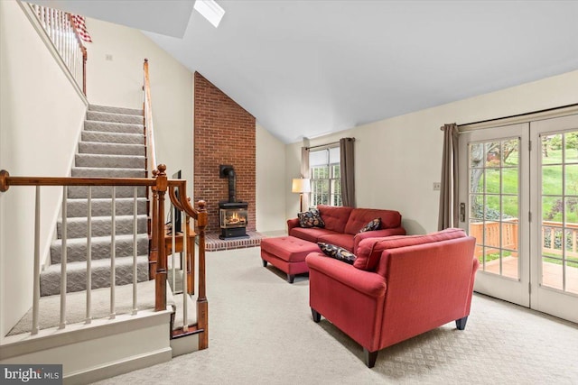3161 Grande Oak Pl, Lancaster, PA 17601 - living room with vaulted ceiling, a wood stove, stairs, and carpet