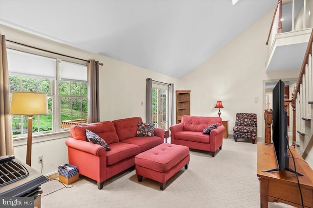 3161 Grande Oak Pl, Lancaster, PA 17601 - living area with carpet flooring, high vaulted ceiling, and stairs